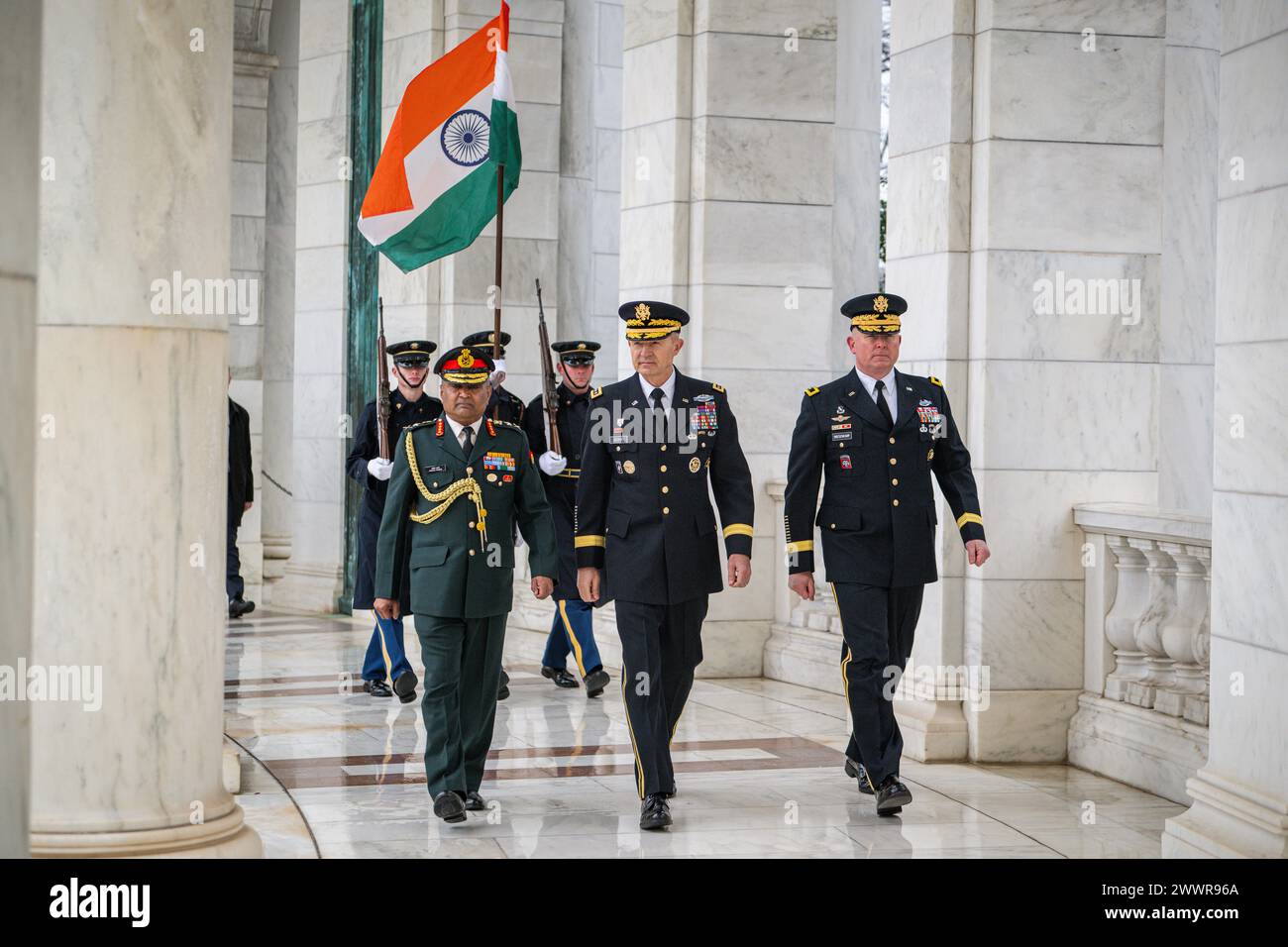 Indian Chief of the Army Staff, Gen. Manoj Pande (left), Chief of Staff of the U.S. Army, Gen. Randy A. George, and U.S. Army Maj. Gen. Trevor J. Bredenkamp, the commander of Joint Force Headquarters-National Capital Region and U.S. Army Military District of Washington, walk together inside the Memorial Amphitheatre at Arlington National Cemetery in Arlington, Va., Feb. 13, 2024.  Army Stock Photo