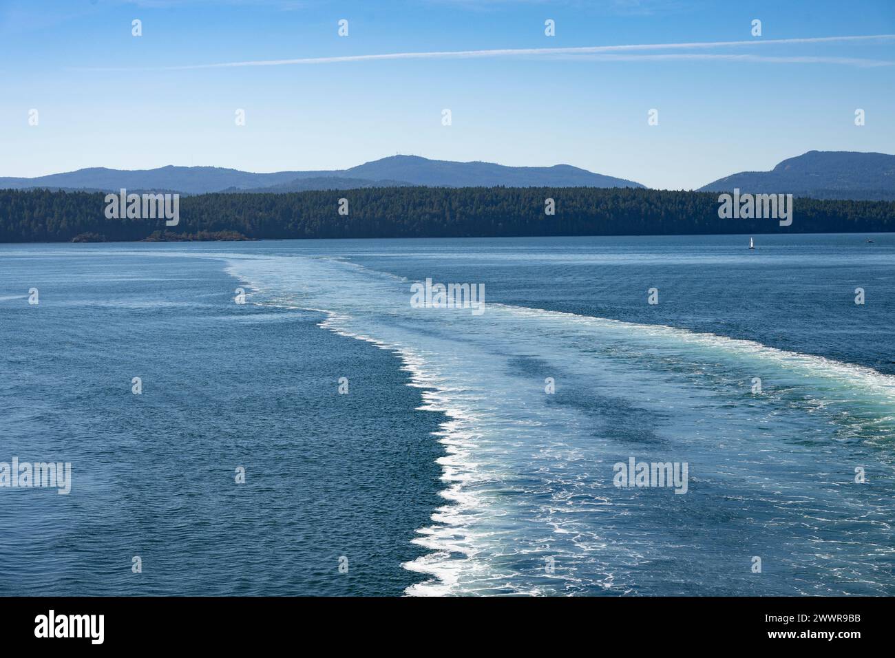 The wake of ocean water flowing behind the ferry boat, Strait of Georgia, British Columbia, Canada Stock Photo