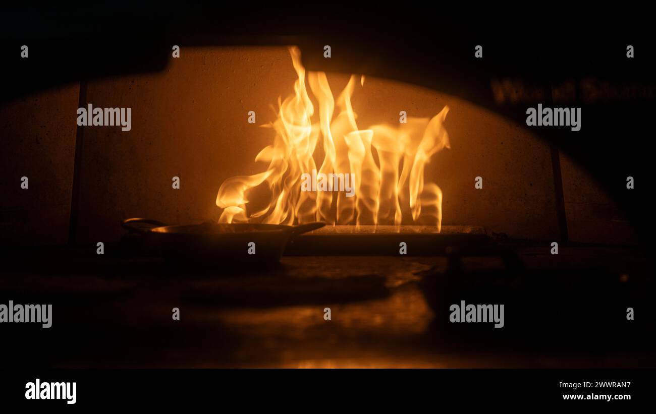Flames in a fireplace, Vancouver, British Columbia, Canada Stock Photo