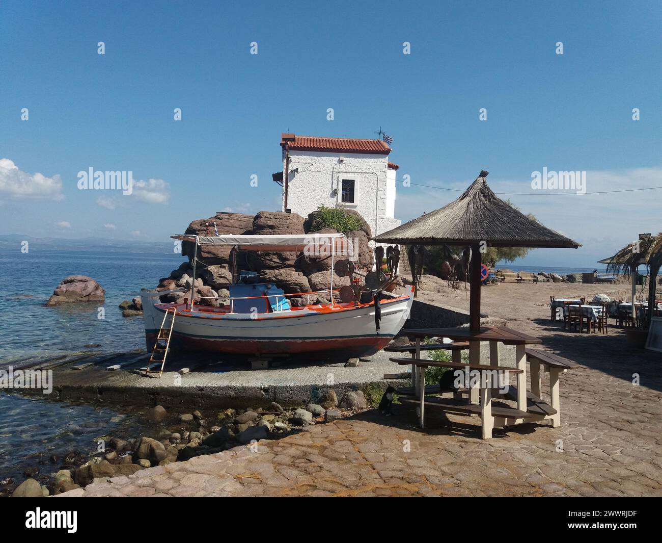 boat-anchored-on-beach-waves-hi-res-stock-photography-and-images-alamy