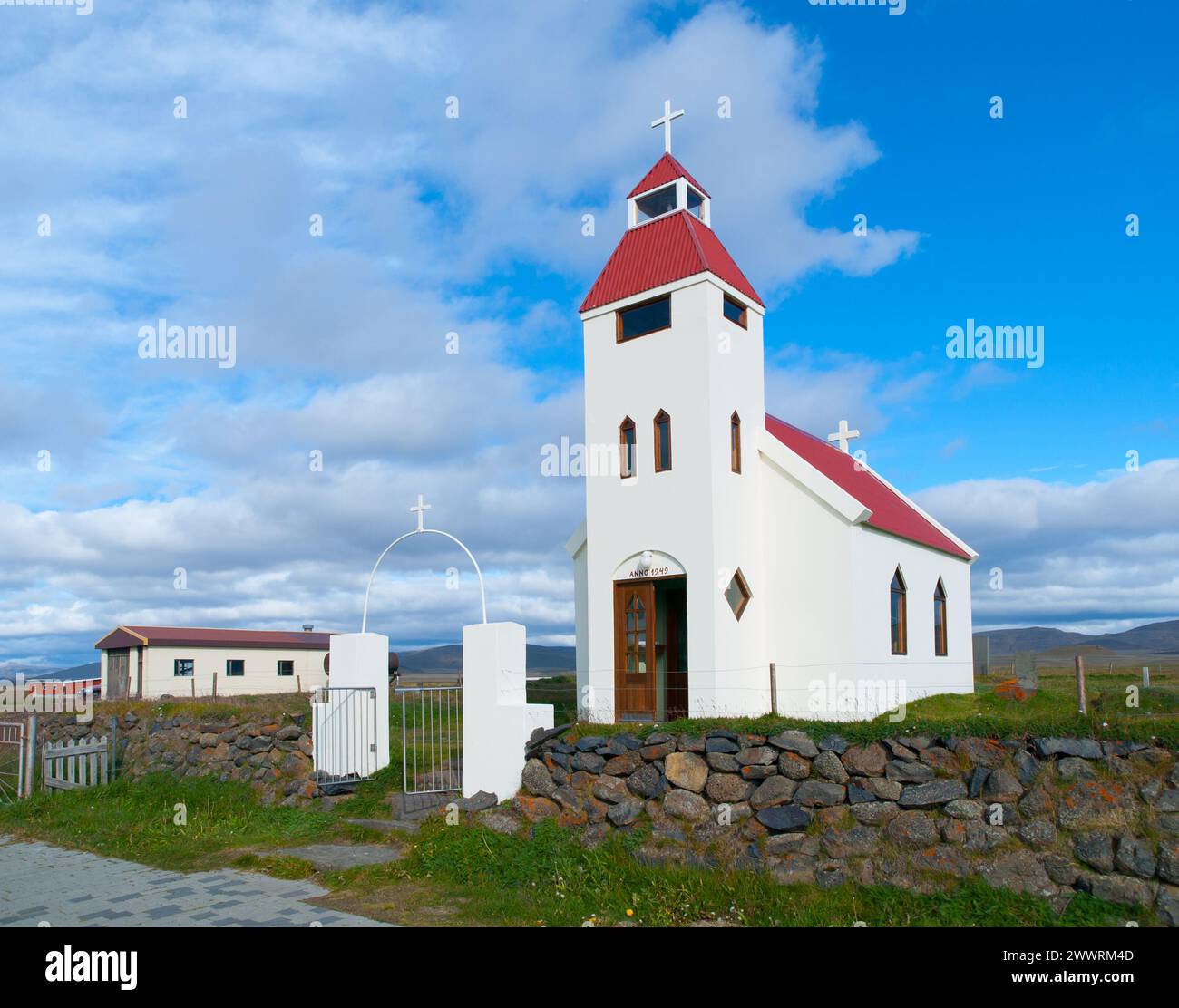 Typical white small church in icelandic village Stock Photo