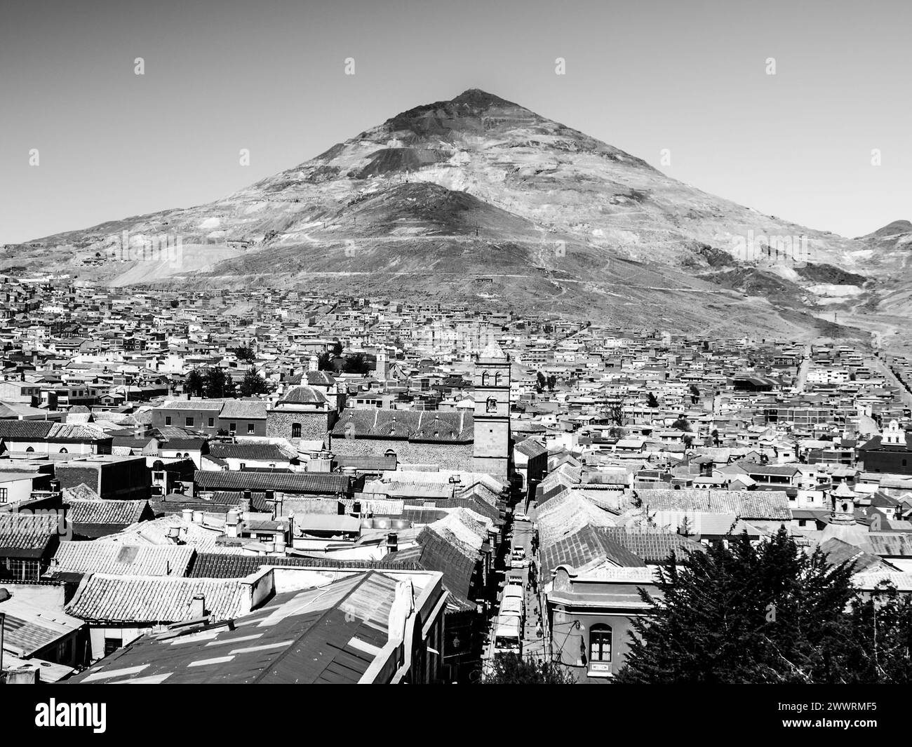 Cerro Rico and rooftops of Potosi centre, view from Cathedral, Bolivia. Black and white image. Stock Photo