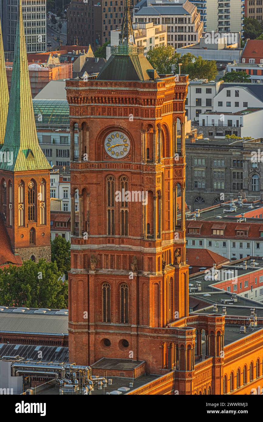 Red Town Hall in Berlin at Alexanderplatz. Historical building with a bell tower in the center of the capital of Germany. View from the top of tower Stock Photo