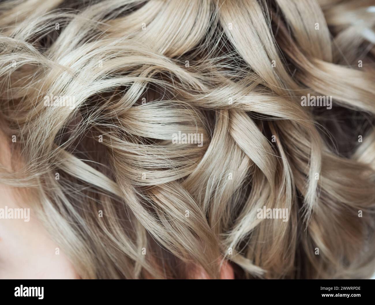 Curly blond hair hi-res stock photography and images - Alamy