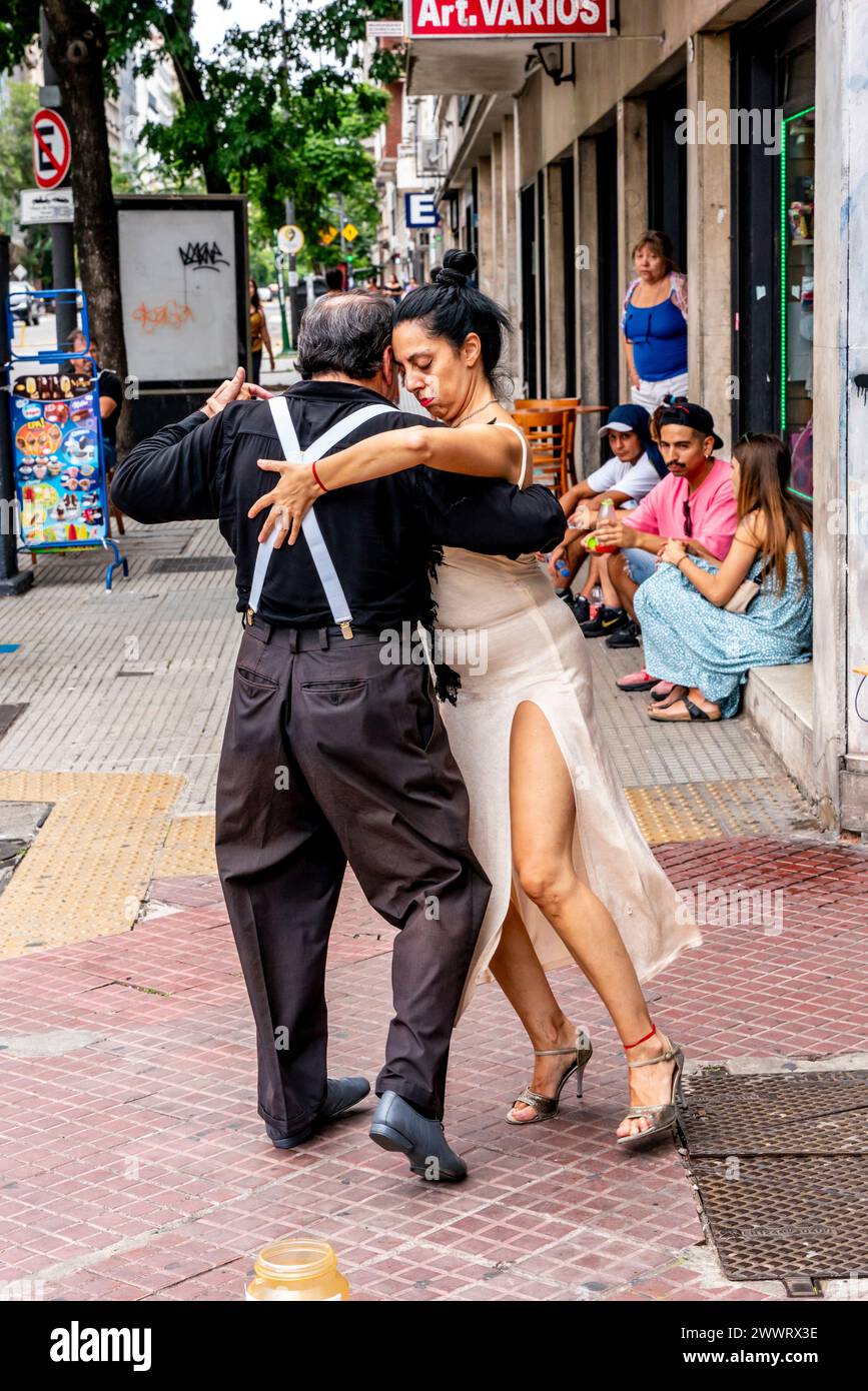 Two Senior Tango Dancers Dancing In The Street, San Telmo District, Buenos Aires, Argentina. Stock Photo