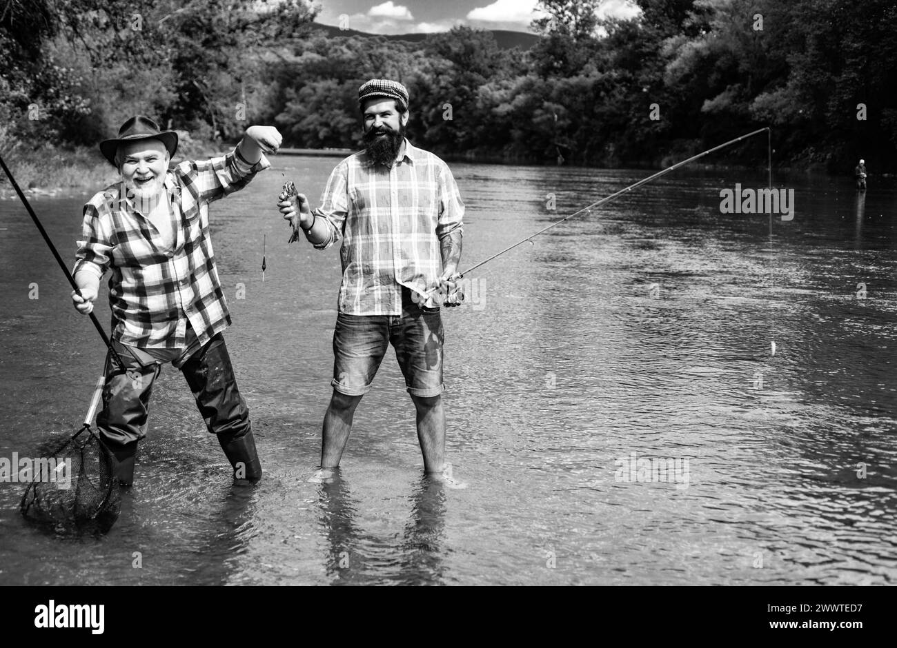 Man friends. Portrait of cheerful senior man fishing. Grandfather and ...