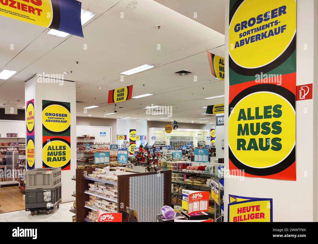 posters with special offers due to shop closure, Germany, North Rhine-Westphalia, Krefeld Stock Photo