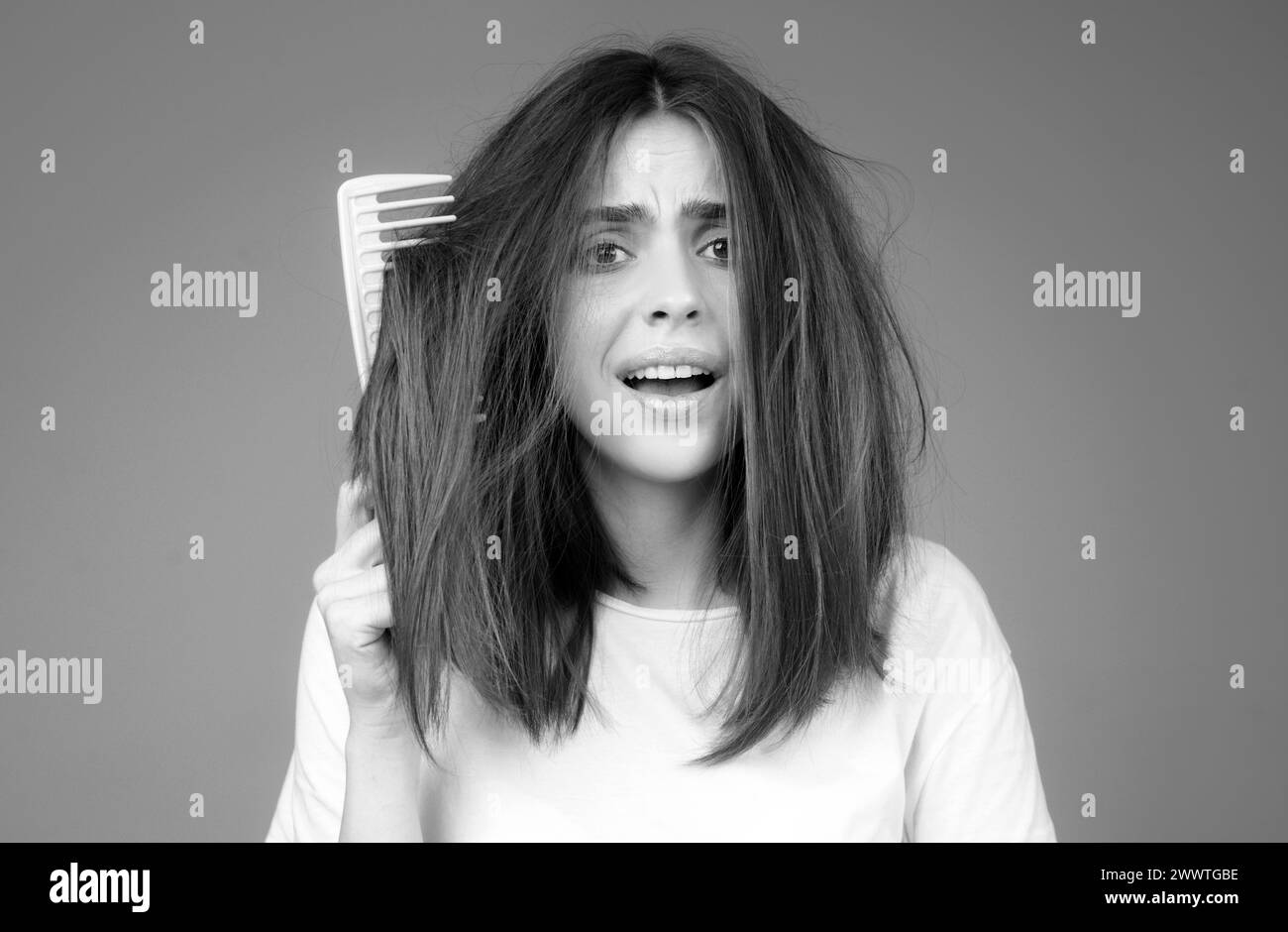 Hair for hair loss problem, woman show her hair tangled damaged hair