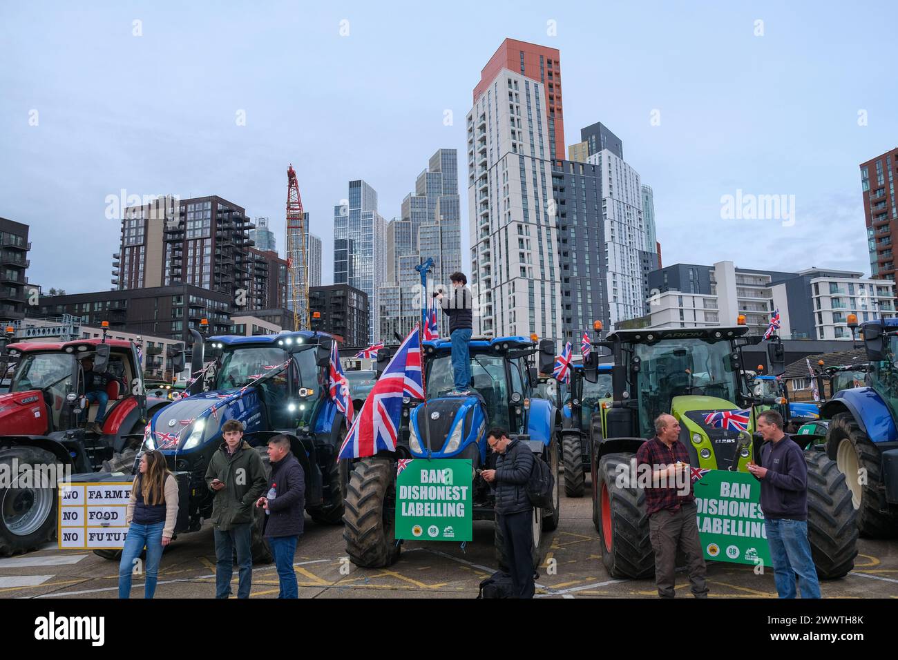 London, UK, 25th March, 2024. Around 100 tractors and agricultural vehicles arrived at the New Covent Garden Market before descending on Parliament in a farming protest, raising concerns over the UK's food security and government policy. Credit: Eleventh Hour Photography/Alamy Live News Stock Photo