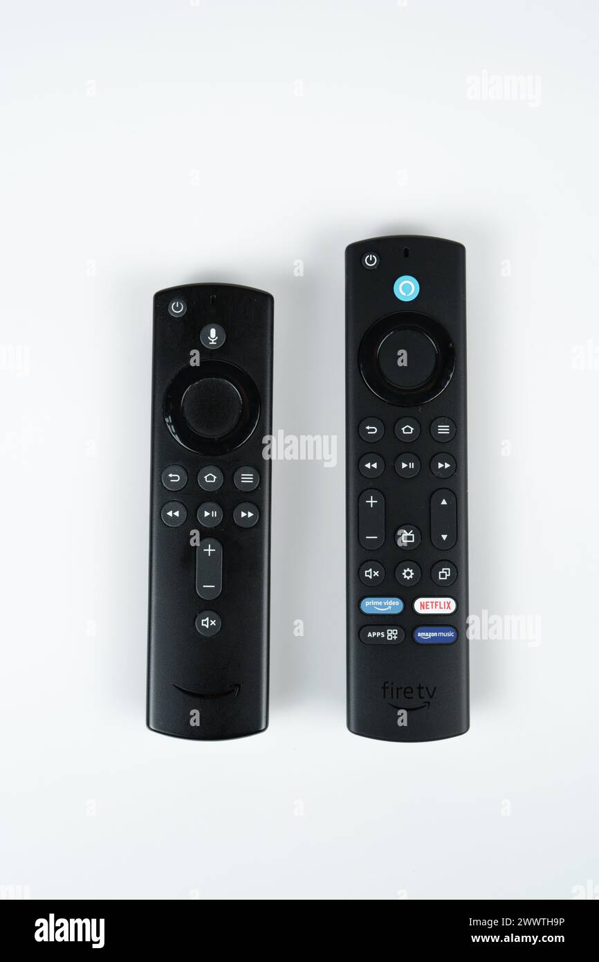 Romotes old and new Amazon Fire TV Stick 4K MAX 2023. Stafford, United Kingdom. March 24, 2024. Stock Photo