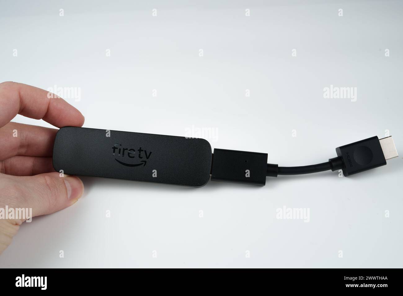 Amazon Fire TV Stick 4K MAX 2023 with HDMI extension cable. The most powerful streaming device from Amazon. Stafford, United Kingdom. March 24, 2024. Stock Photo