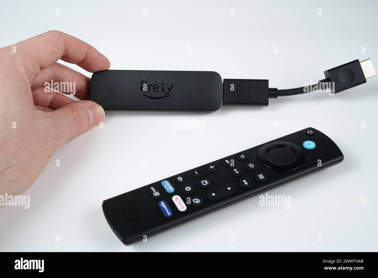 Amazon Fire TV Stick 4K MAX 2023 with HDMI extension cable and the remote. The most powerful streaming device from Amazon. Stafford, United Kingdom. M Stock Photo