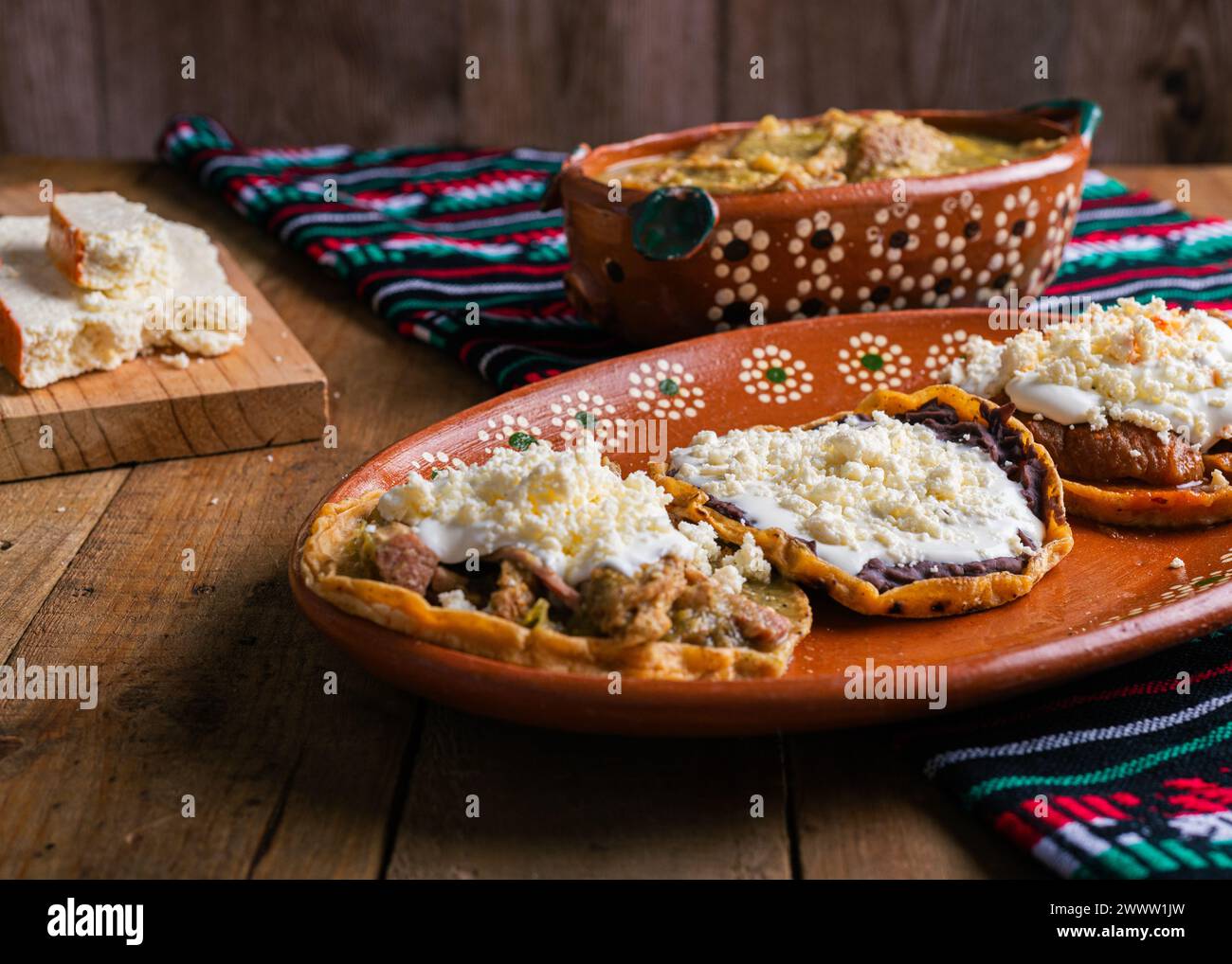 Sopes of chicharron in green sauce and red sauce. Mexican food Stock