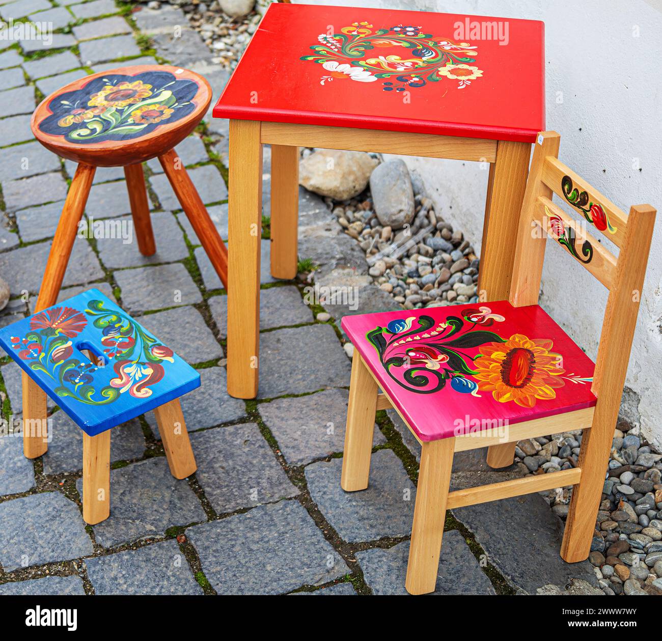 Sighisoara Transylvania Romania September 3 2021 Children s table and chairs hand painted with floral patterns from Hungarian folklore and displ Stock Photo Alamy