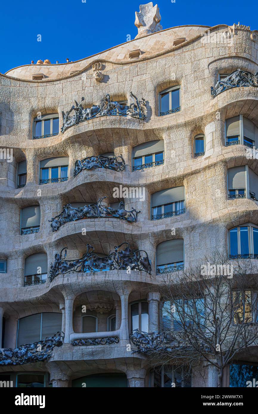 Barcelona, Catalonia, Spain - February 27, 2022: Exterior of the Casa Mila or La Pedrera.It was the last private residence designed by Antoni Gaudi, b Stock Photo