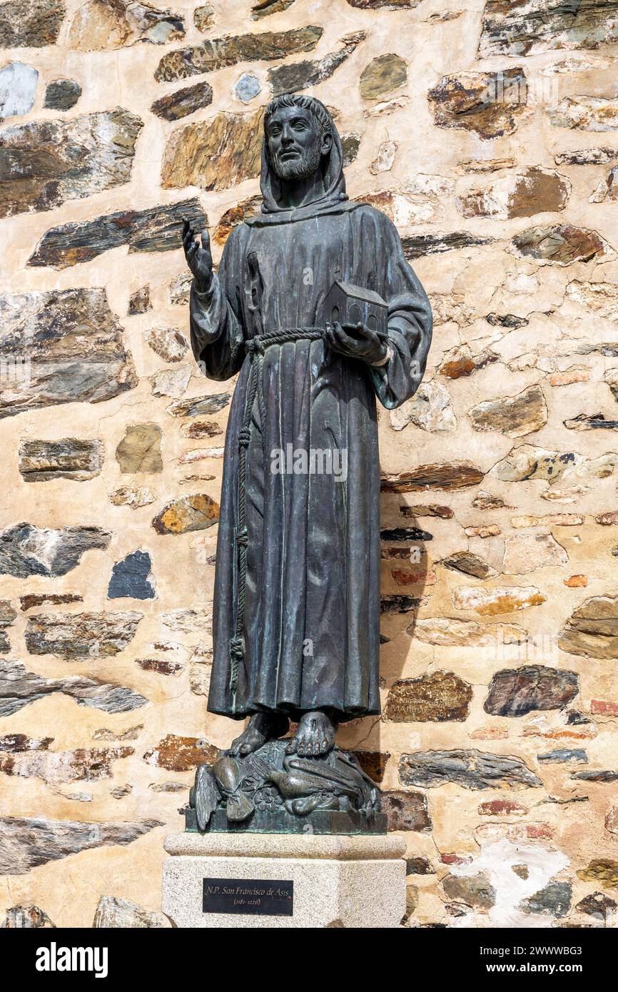 Statue of Francis of Assisi, Monastery of Saint Mary of Guadalupe, Guadalupe, Extremadura, Spain Stock Photo