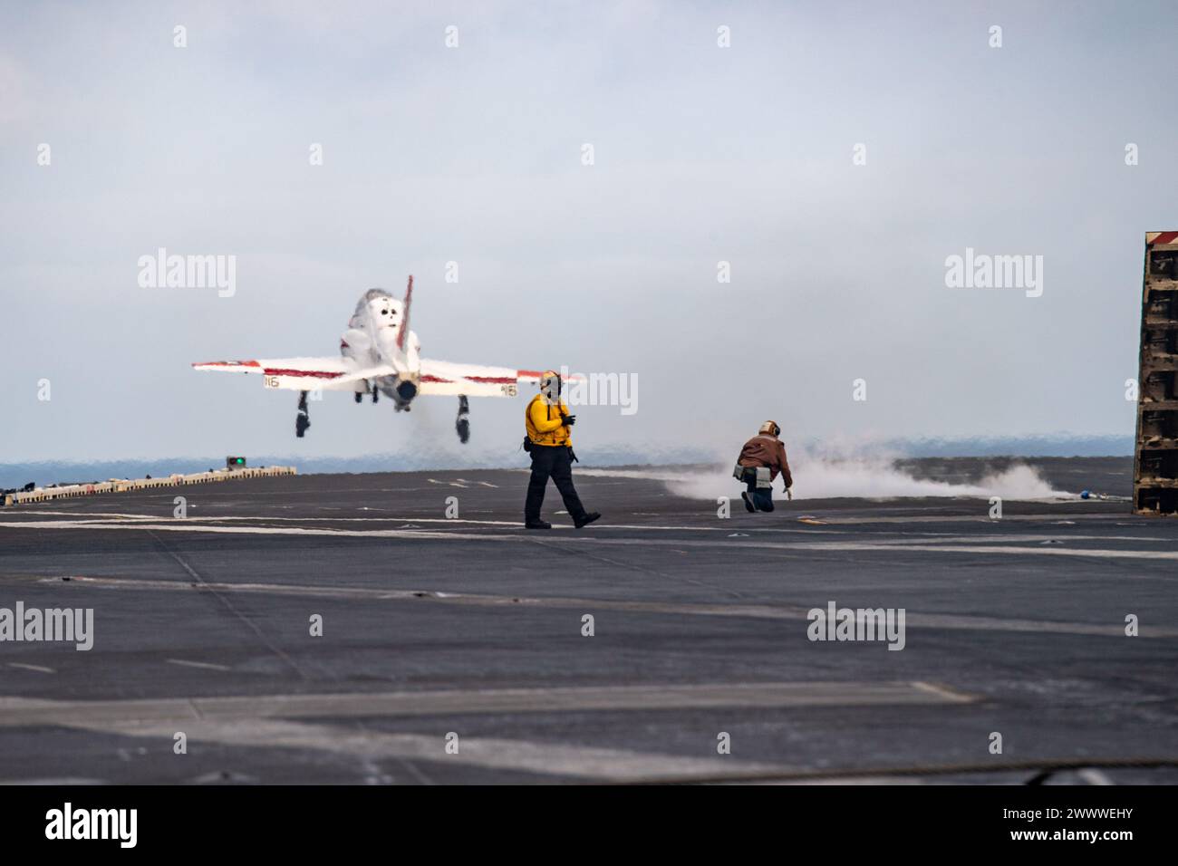 240317-N-FY193-1218 ATLANTIC OCEAN (Mar. 17, 2024) A T-45 Goshawk, attached to the “Eagles” of Strike Jet Training Squadron (VT) 7, launches off Stock Photo