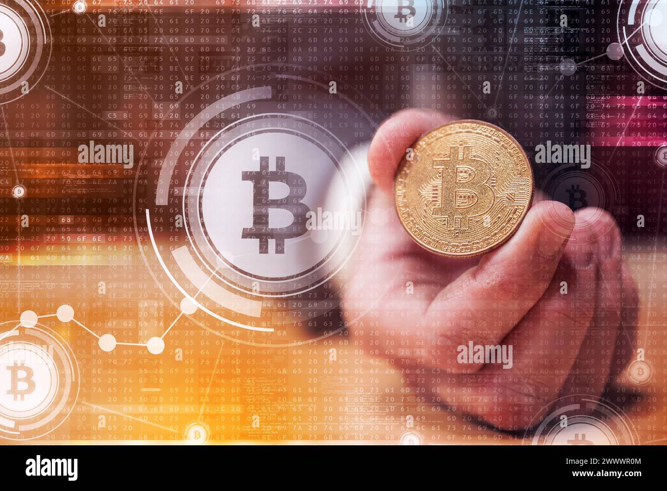 Bitcoin cryptocurrency trading concept, closeup of hand with coin, selective focus Stock Photo