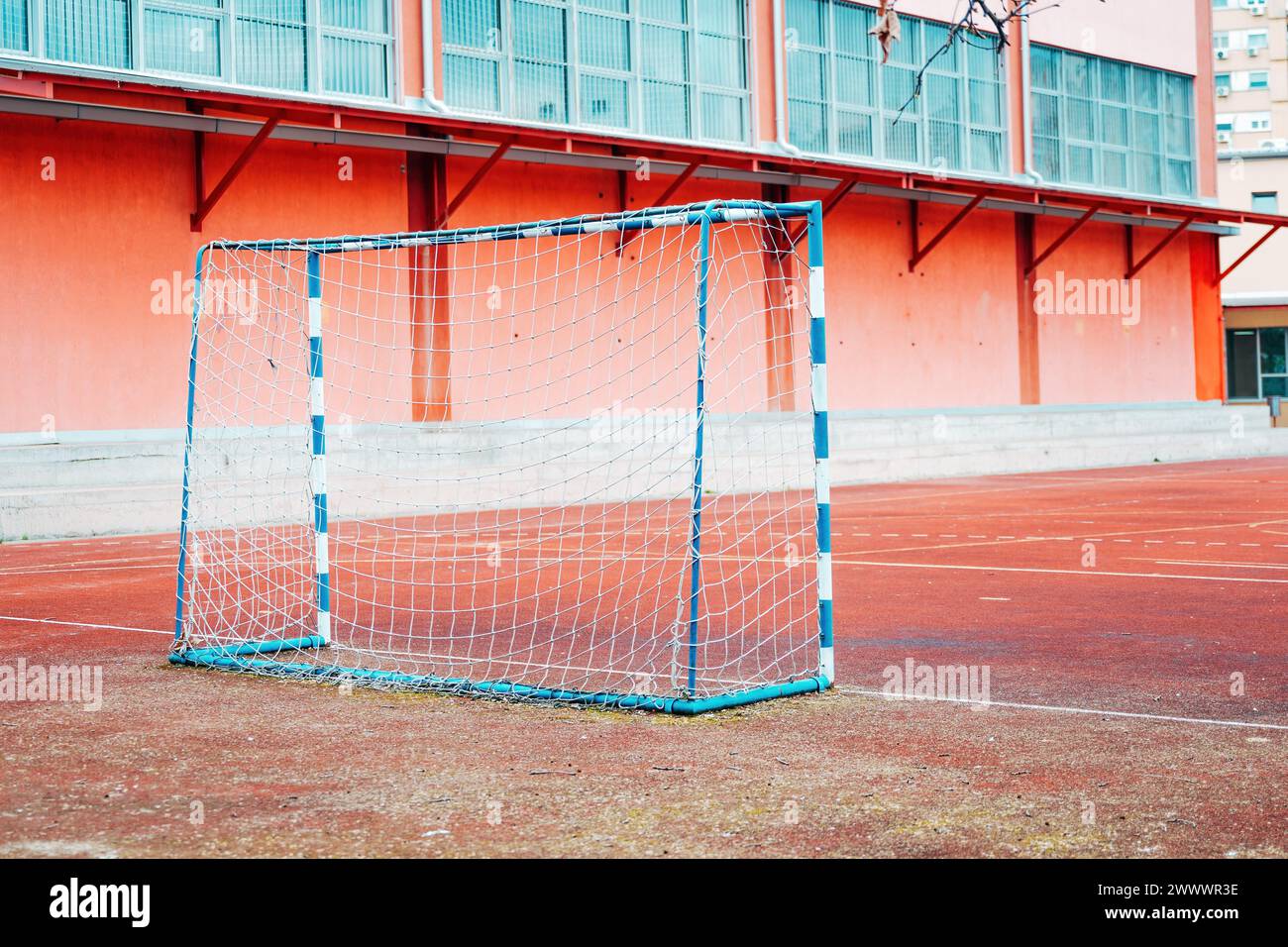 Handball goal on outdoor pitch in school playground, selective focus Stock Photo