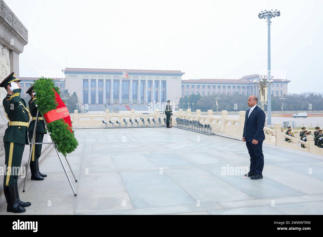 Beijing, China. 26th Mar, 2024. Nauruan President David Adeang lays a