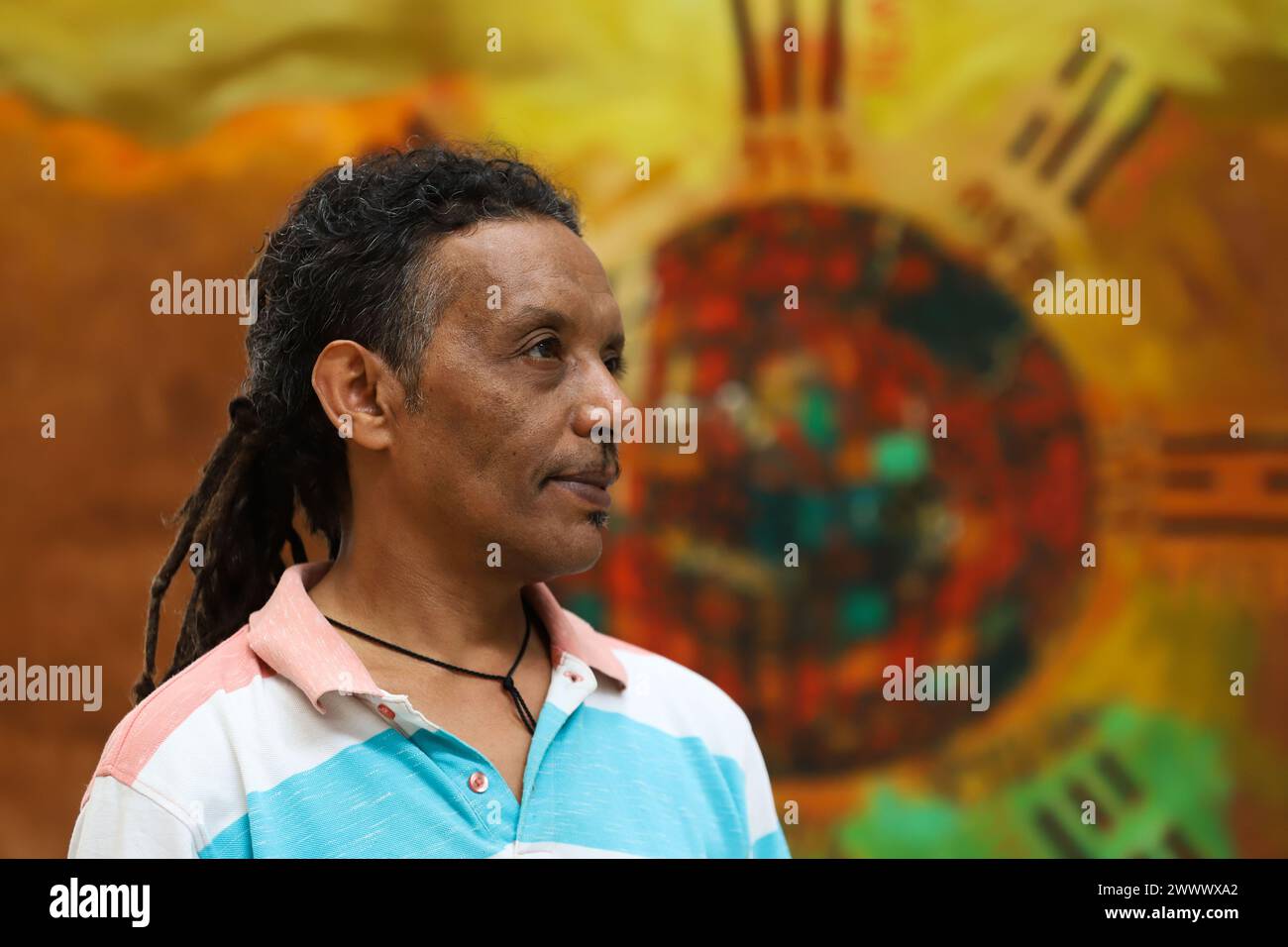 Addis Ababa, Ethiopia. 18th Mar, 2024. Artist Dawit Muluneh poses for a