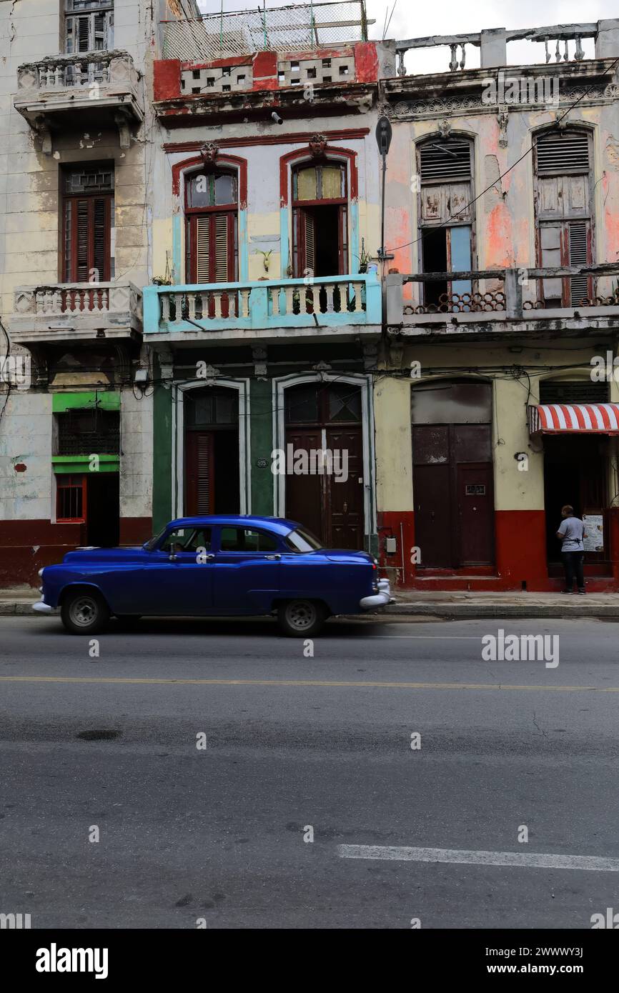 117 Old dark blue almendron car -yank tank, Buick classic- from 1952 drives down Calle San Lazaro Street way to Paseo del Prado. Havana Centro-Cuba. Stock Photo
