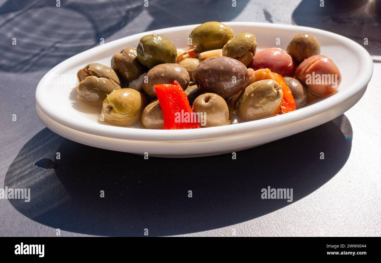 Green olives and pimentos tapa Stock Photo Alamy