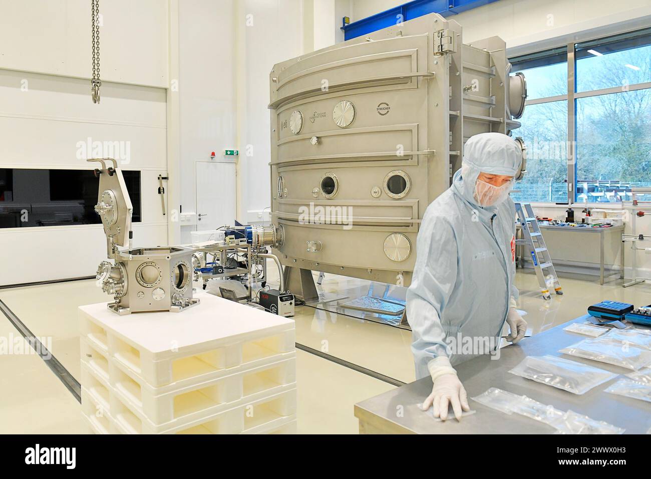 Production of vacuum chambers for European Space Agency (ESA), left, and for ELI Beamlines international laser research centre, right, in STREICHER company in Pilsen - Stenovice, part of the globally operating STREICHER Group, Czech Republic, March 26, 2024. STREICHER company, which develops and manufactures vacuum equipment for the food, pharmaceutical, semiconductor and space industries as well as for research, got a prestigious contract by the European Space Agency (ESA). It will deliver a vacuum chamber for simulating the space environment to its laboratories in April. In the same month, i Stock Photo