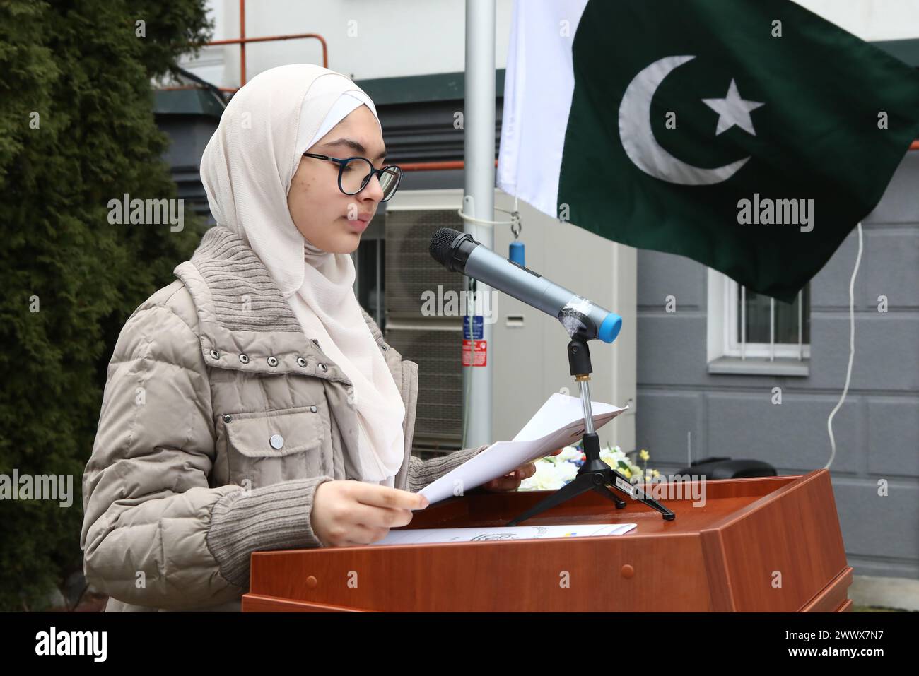 KYIV, UKRAINE - MARCH 23, 2024 - Ms. Ayesha Jawa reciting the Holy Quran as part of a solemn event in honor of the Day of Pakistan, Kyiv, capital of Ukraine. Stock Photo