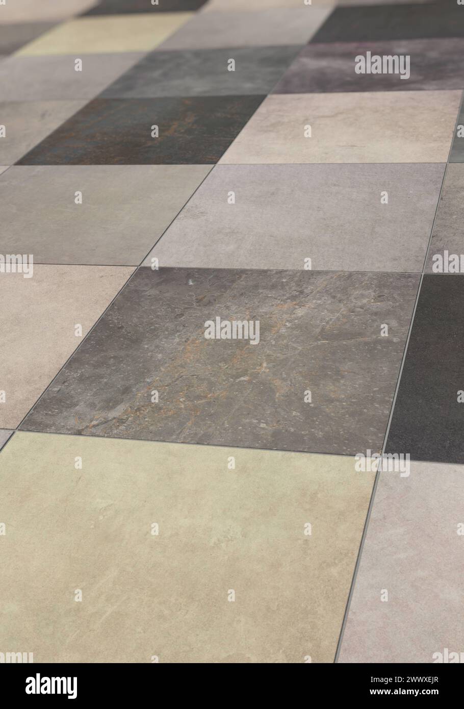 Verschiedene quadratische Bodenfliesen verarbeitet, Hochformat Fliesen in verschiedenen Designs als Bodenbelag verlegt, im Hochformat *** Various square floor tiles processed, portrait format Tiles in various designs laid as floor covering, in portrait format Stock Photo