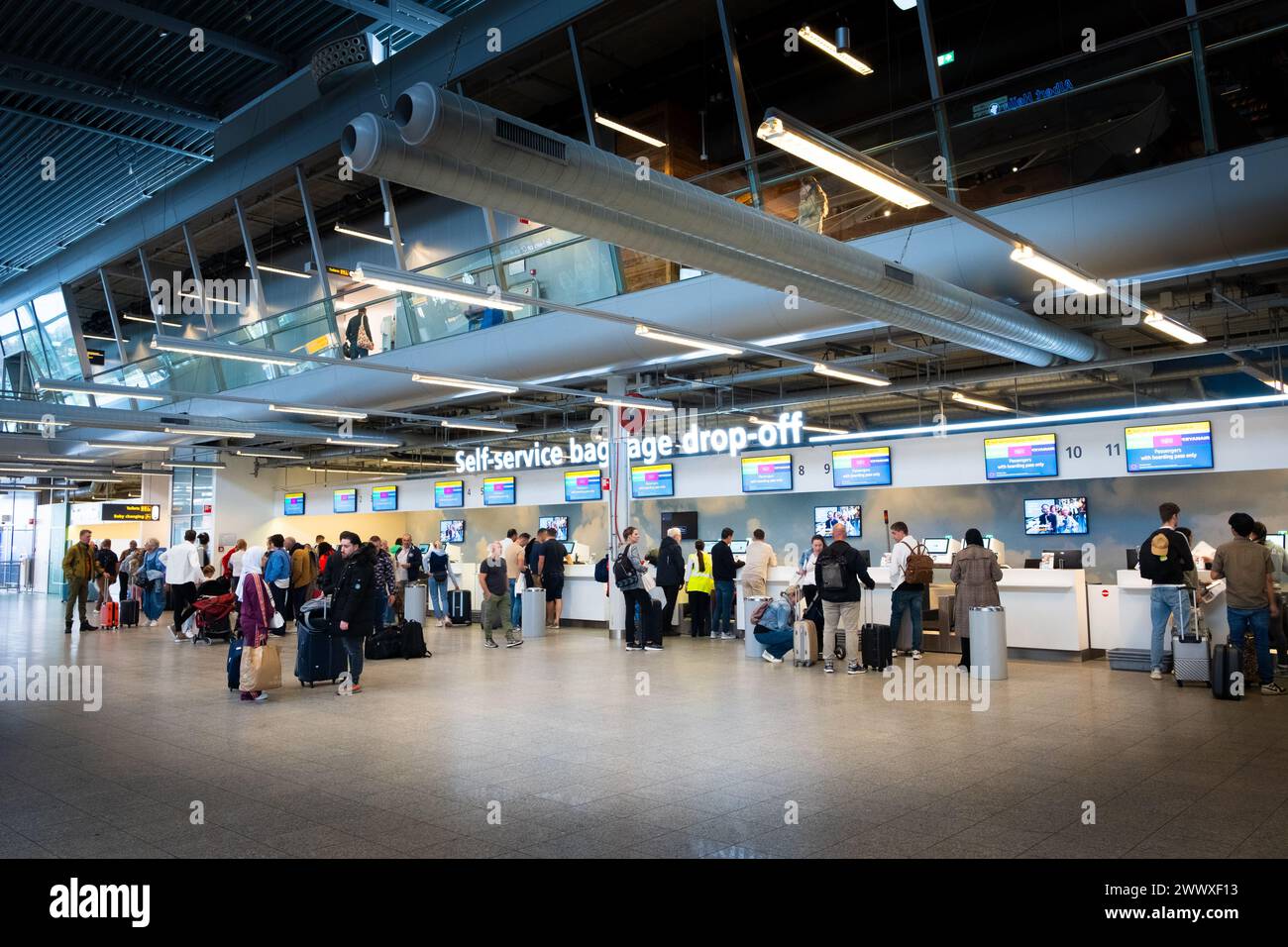 Eindhoven Airport Netherlands Passenger Terminal self service baggage drop off Stock Photo