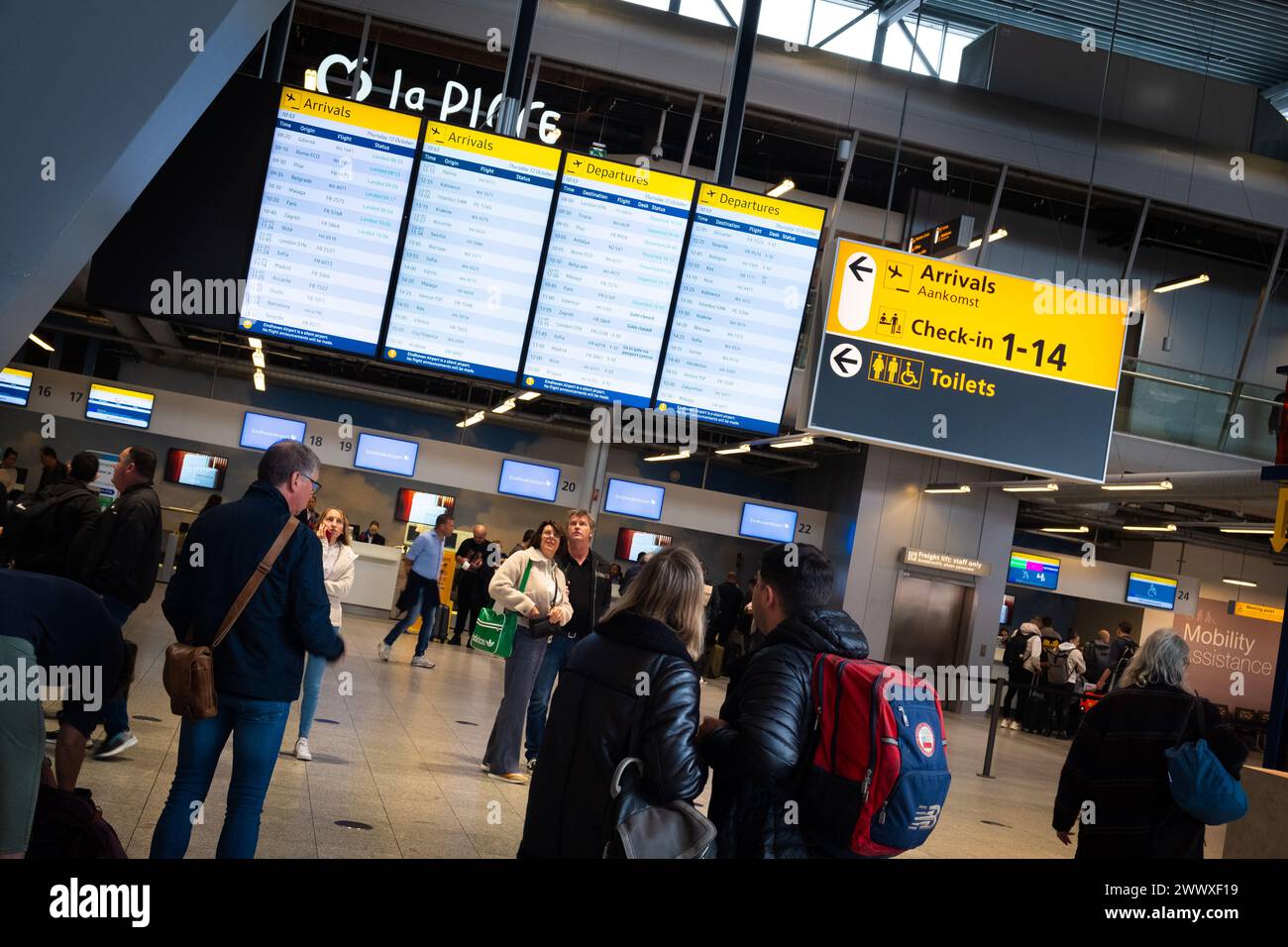Arrivals departures board at Eindhoven Airport Netherlands Passenger Terminal Stock Photo
