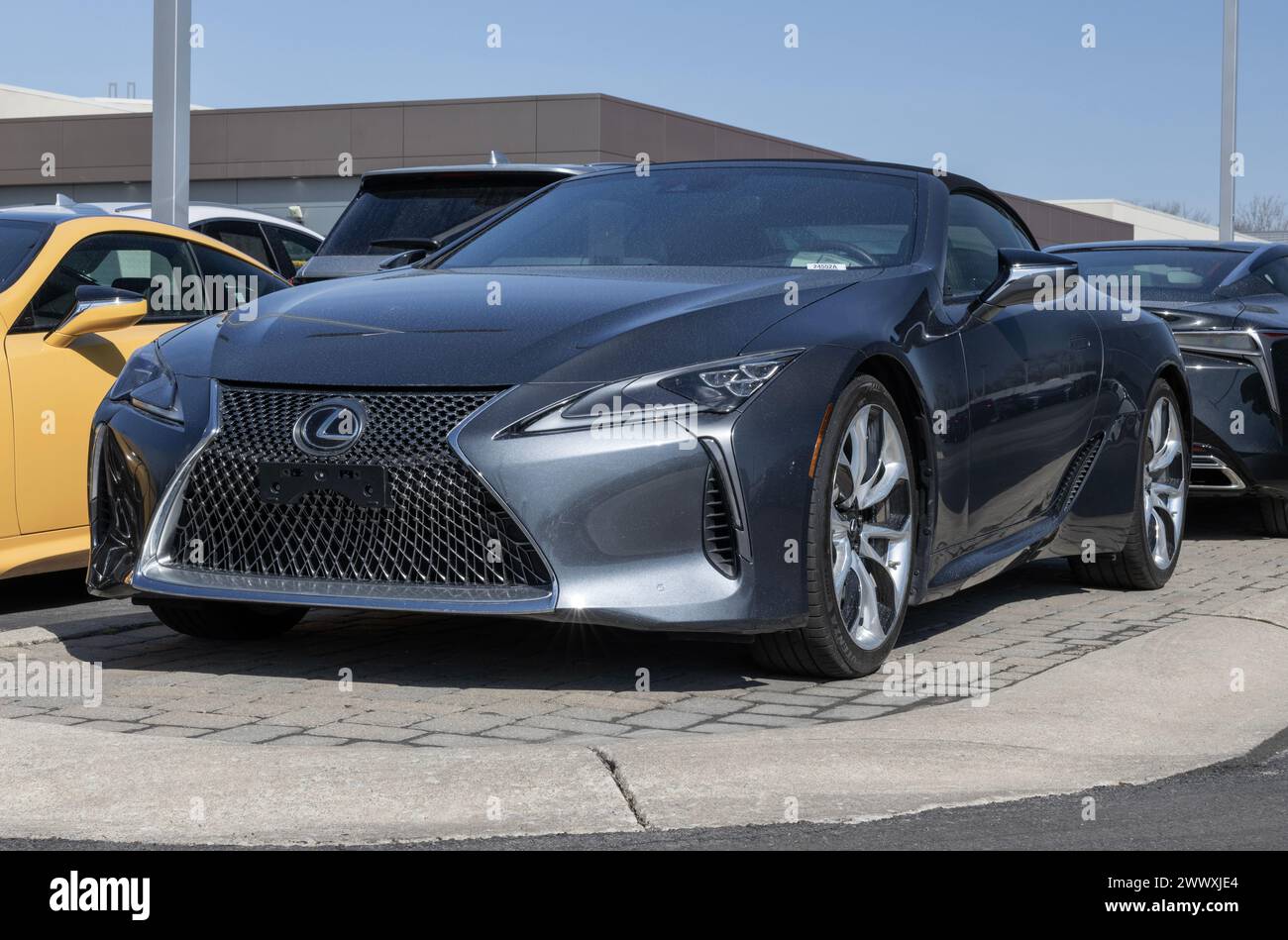 Indianapolis - March 24, 2024: Lexus LC 500 Convertible display at a dealership. Lexus offers the LC500 in Hybrid and Convertible models. MY:2023 Stock Photo