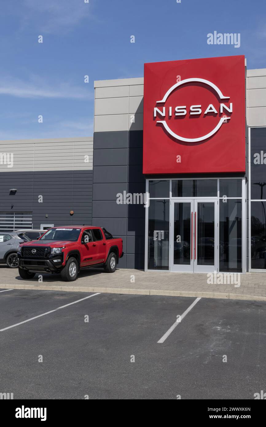 Indianapolis - March 24, 2024: Nissan Frontier SV Crew Cab display. Nissan offers the Frontier in S, SV, PRO-X, PRO-4X, and Midnight Edition. MY:2024 Stock Photo