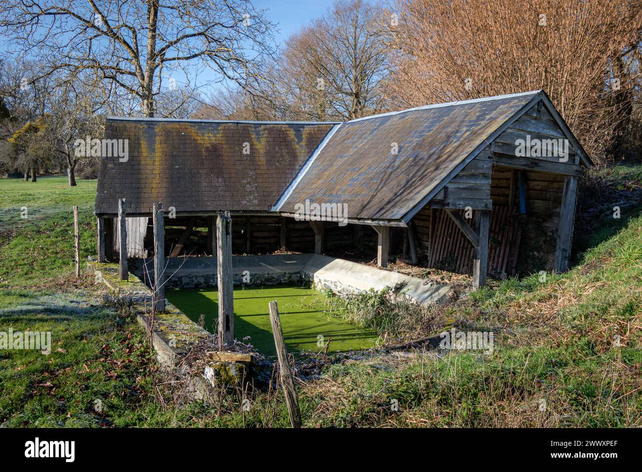 French Lavoir (communal wash house) situated in Lignaud, Lourdoueix-Saint-Pierre. Stock Photo