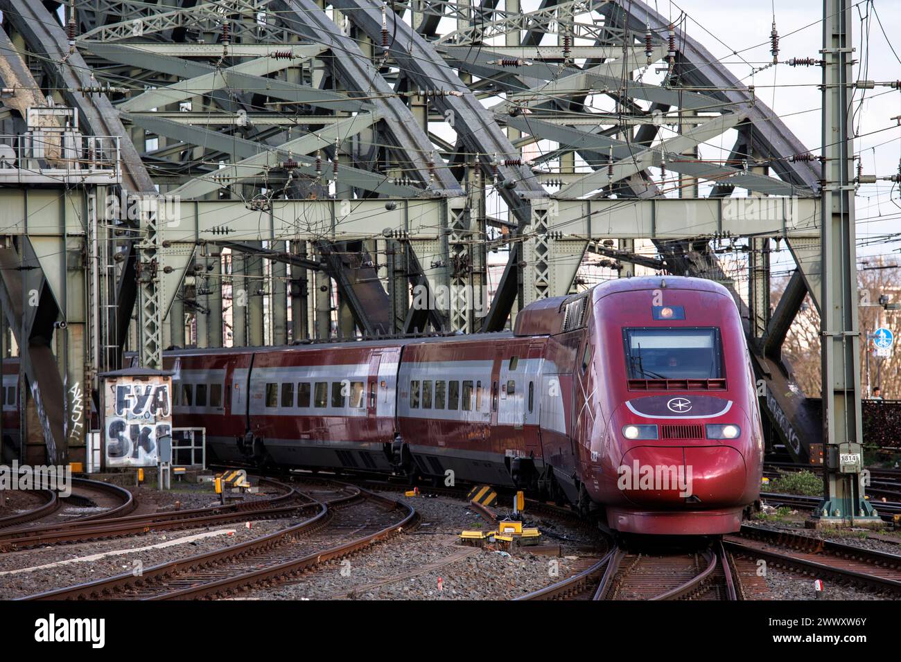 Eurostar high-speed train on arrival at Cologne main station, Hohenzollern bridge, Cologne, Germany. Since October 2023, the former Thalys trains run Stock Photo