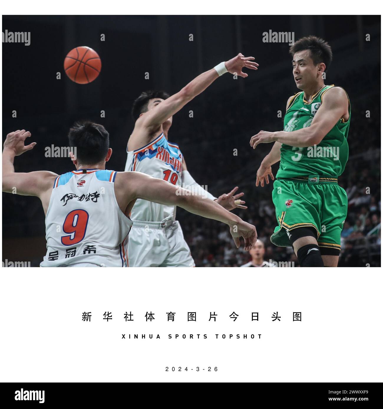 Beijing, China's Liaoning Province. 26th Mar, 2024. Zhao Jiwei (R) of Liaoning Flying Leopards passes the ball during the 48th round match between Xinjiang Flying Tigers and Liaoning Flying Leopards at 2023-2024 season of the Chinese Basketball Association (CBA) league in Shenyang, northeast China's Liaoning Province, March 26, 2024. Credit: Pan Yulong/Xinhua/Alamy Live News Stock Photo
