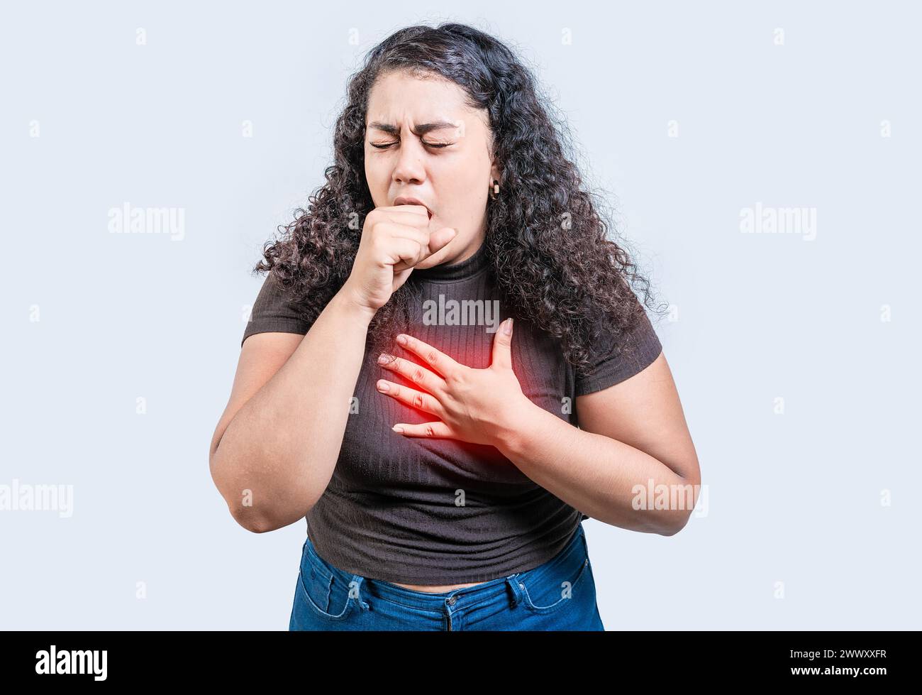 Girl with bronchitis coughing hard isolated. Young woman suffering from cough isolated Stock Photo