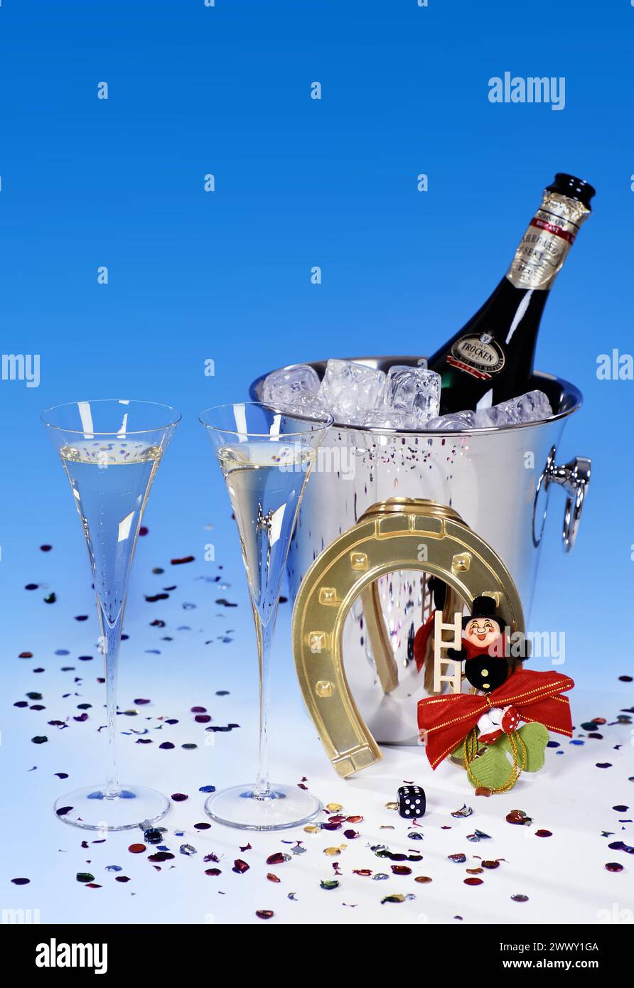 New Year's Eve decorations, champagne and lucky charms for New Year's Eve Stock Photo