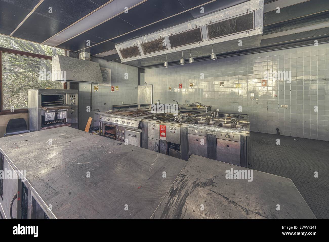 Centre of an abandoned industrial kitchen with visible signs of use on the appliances, Institute of Molecular Biology, Lost Place Stock Photo