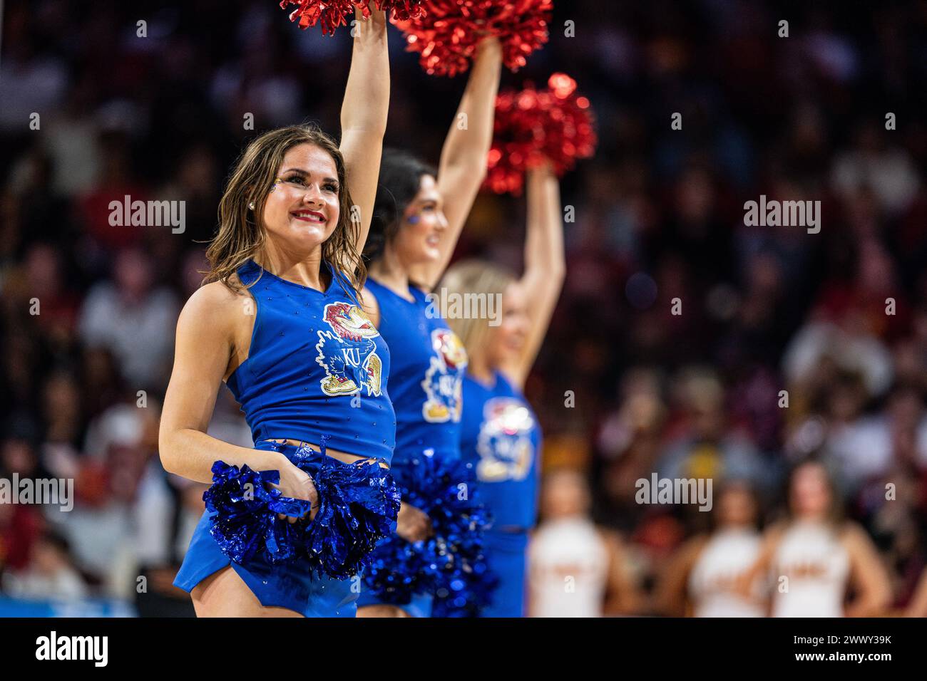 Kansas Jayhawks cheerleaders during the second round of the NCAA women’s basketball championship game against the USC Trojans, Monday, March 25, 2024, Stock Photo