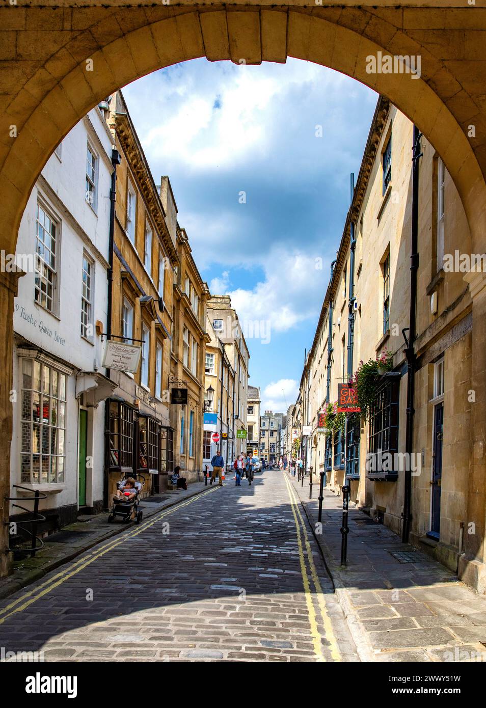 Arch leading to Queen Street in the city of Bath Somerset UK Stock Photo