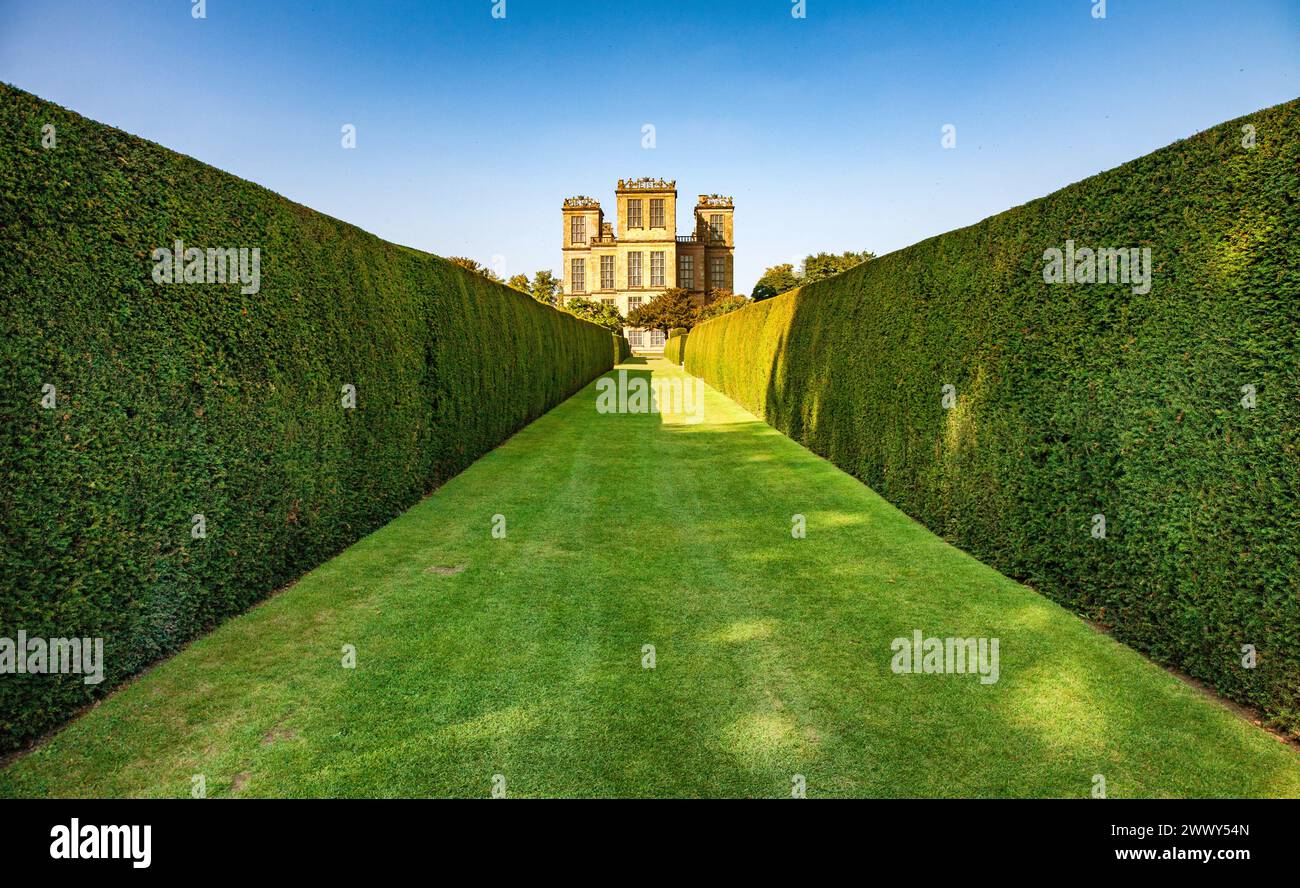 South aspect of Hardwick Hall in Derbyshire UK seen from the garden's long yew walk Stock Photo