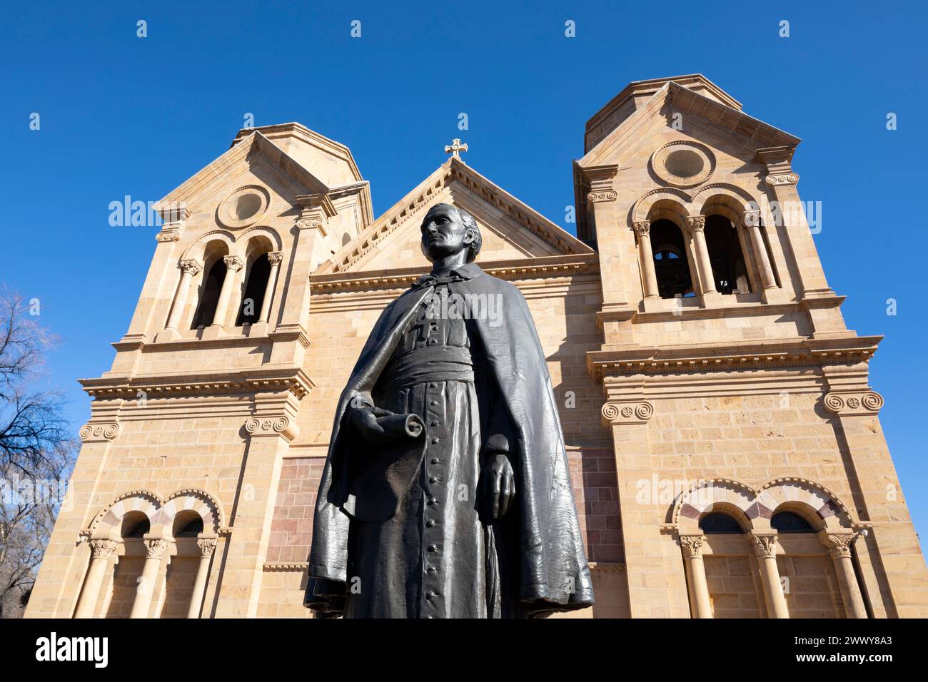 NM00664-00.....NEW MEXICO - Cathedral Basillica Of St Francis  with sculpture of Arch Biship J.B. Lamy in Santa Fe. Stock Photo