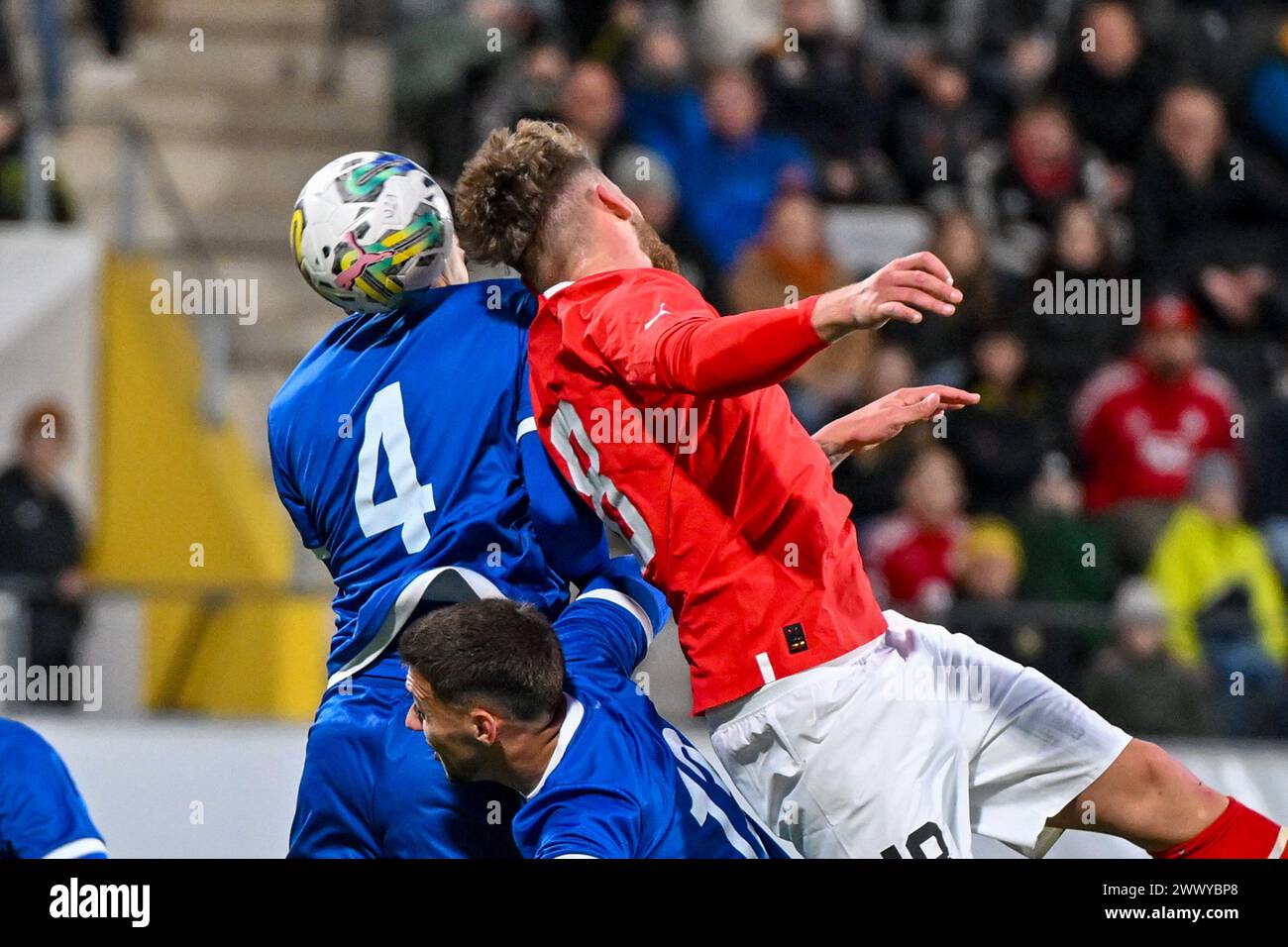 26.03.2024, Innviertel Arena Ried, AUT, U21 EM-Qualifikation 2025 - Oesterreich vs Zypern, im Bild David Riegler (AUT) vs Evagoras Antoniou (CYP), Strahinja Kerkez (CYP) .// Uefa U21 Euro 2025 Qualifikation Match between Austria and Cyprus in Ried, Austria on 2024/03/26 - 20240326 PD6756 Stock Photo