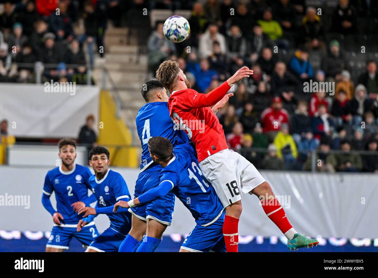 26.03.2024, Innviertel Arena Ried, AUT, U21 EM-Qualifikation 2025 - Oesterreich vs Zypern, im Bild David Riegler (AUT) vs Evagoras Antoniou (CYP), Strahinja Kerkez (CYP) .// Uefa U21 Euro 2025 Qualifikation Match between Austria and Cyprus in Ried, Austria on 2024/03/26 - 20240326 PD6765 Stock Photo