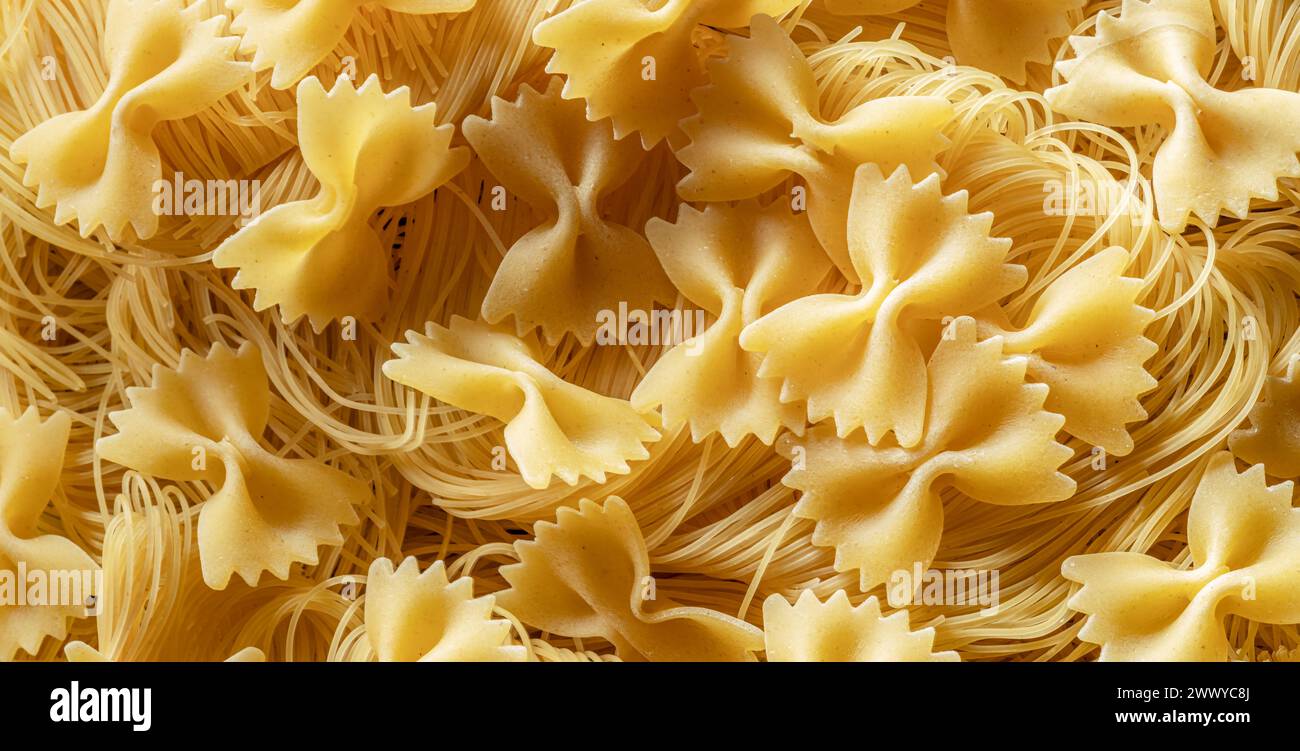 Italian pasta farfalle close-up. Food background. Stock Photo