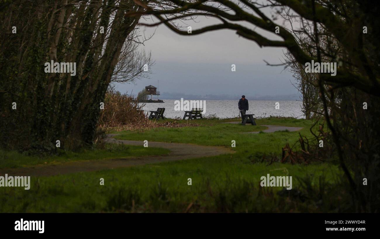 Kinnego, Lough Neagh, County Armagh, Northern Ireland, UK. 26th Mar 2024. UK weather - a drab grey and damp spring day in a cold easterly wind at Lough Neagh. A grey day on Lough Neagh. Credit: CAZIMB/Alamy Live News.. Stock Photo