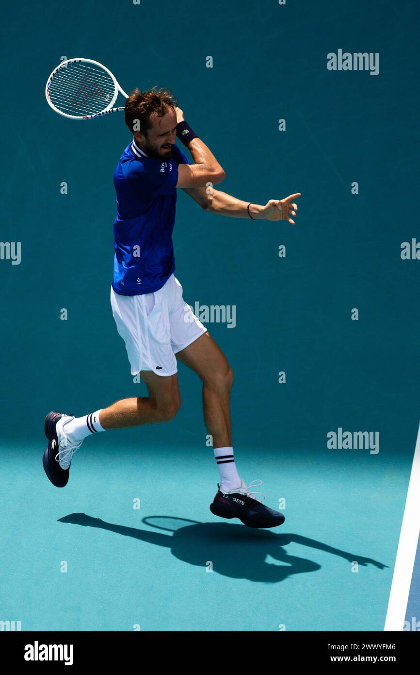MIAMI GARDENS, FLORIDA - MARCH 26: Daniil Medvedev returns a shot against Dominik Koepfer of Germany during their match on Day 11 of the Miami Open at Hard Rock Stadium on March 26, 2024 in Miami Gardens, Florida. (Photo by Mauricio Paiz) Stock Photo