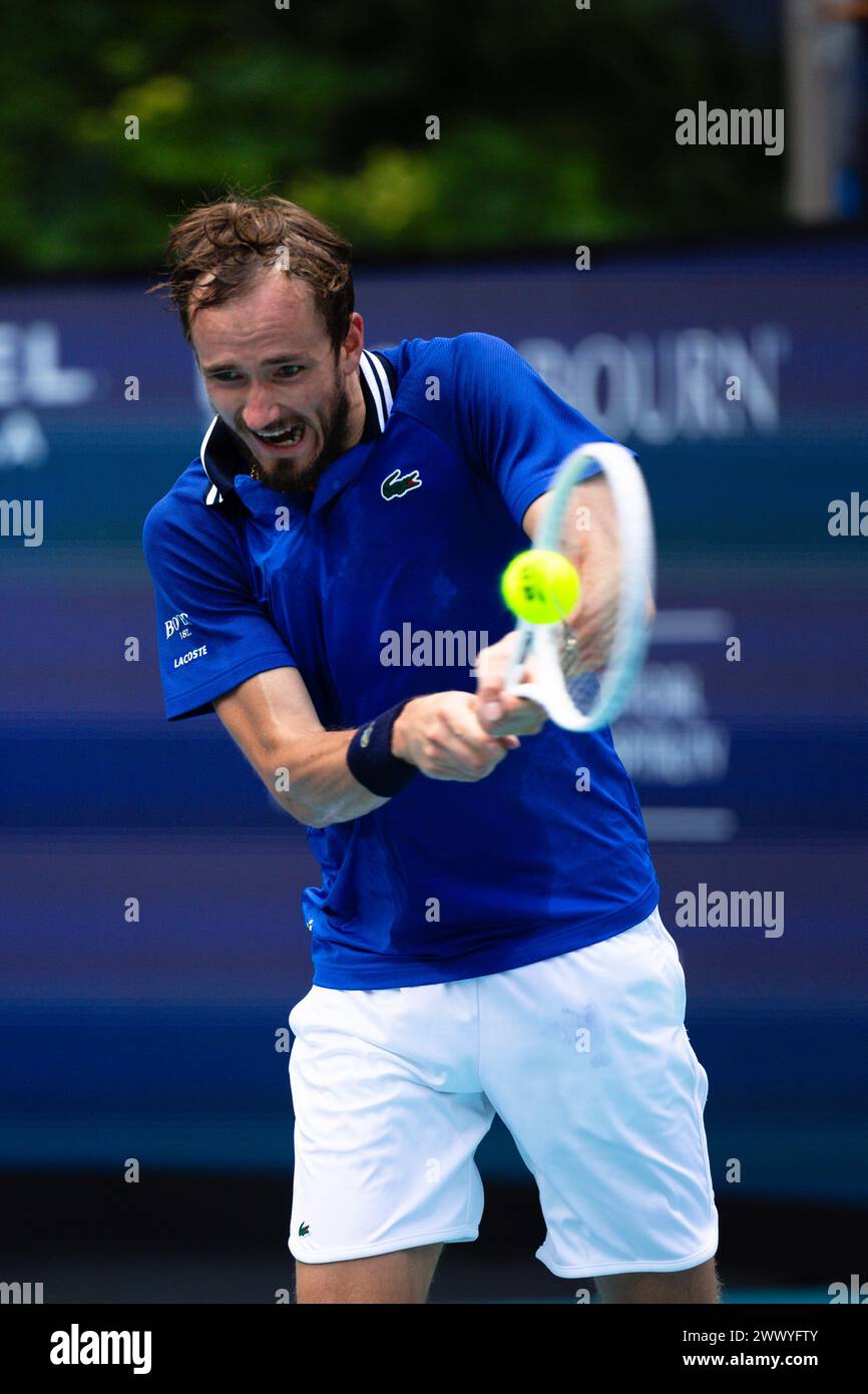 MIAMI GARDENS, FLORIDA - MARCH 26: Daniil Medvedev returns a shot against Dominik Koepfer of Germany during their match on Day 11 of the Miami Open at Hard Rock Stadium on March 26, 2024 in Miami Gardens, Florida. (Photo by Mauricio Paiz) Stock Photo